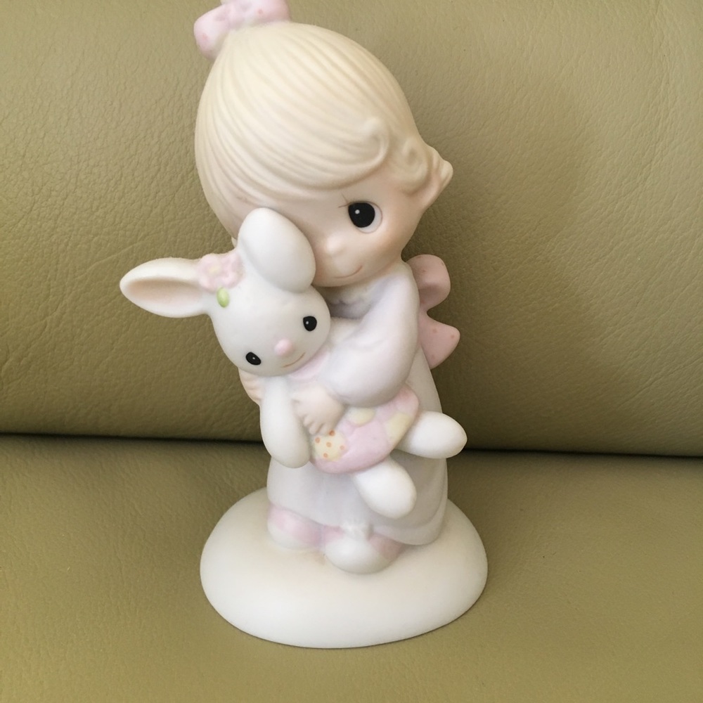 Precious moments porcelain figurine